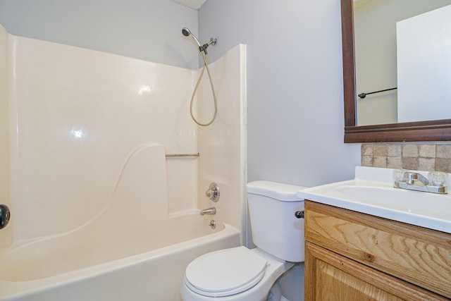 full bath with shower / washtub combination, backsplash, toilet, and vanity