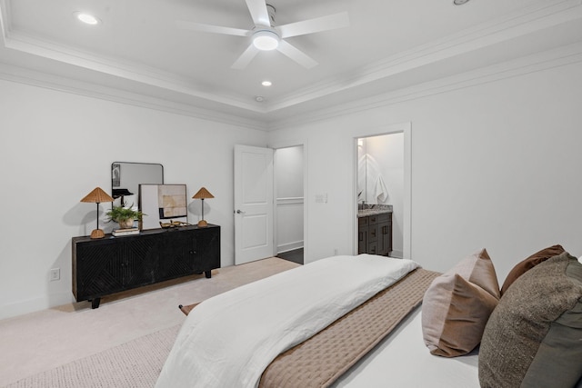 carpeted bedroom with ceiling fan, recessed lighting, baseboards, ornamental molding, and a raised ceiling