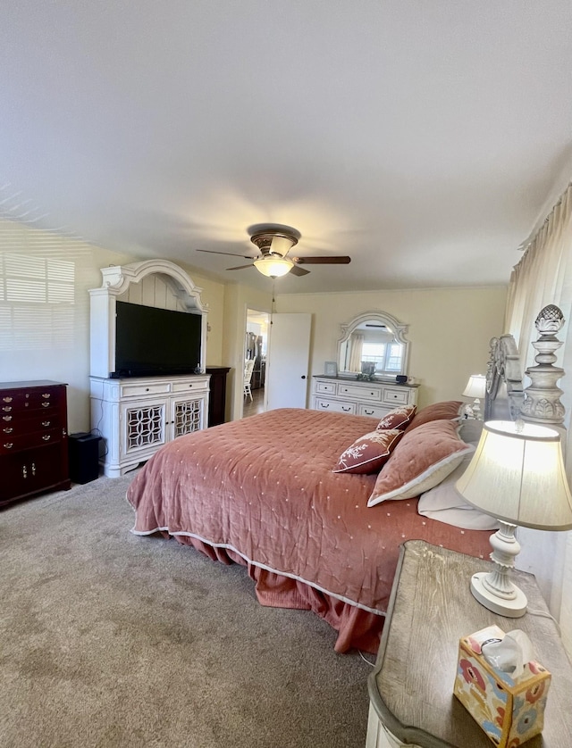 bedroom featuring carpet floors and a ceiling fan