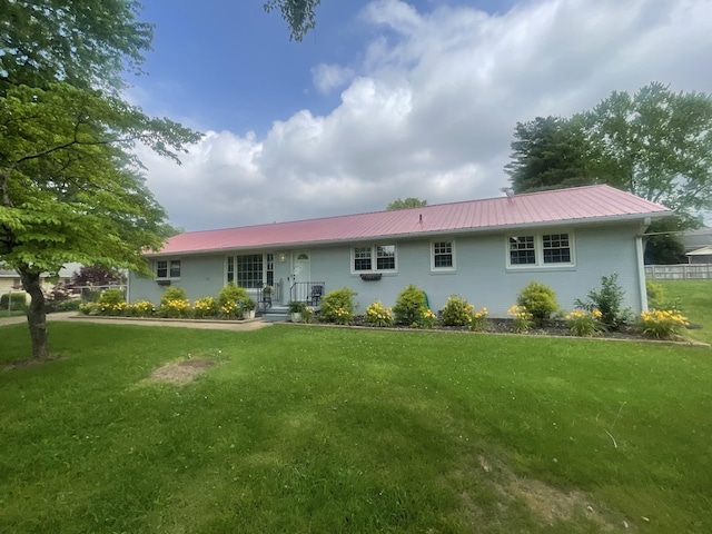 502 9th St, Lawrenceburg, TN 38464 - view of front of property with metal roof and a front lawn