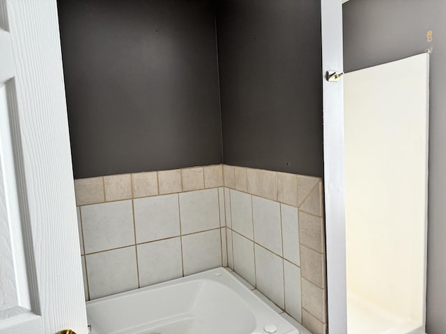 bathroom featuring a garden tub