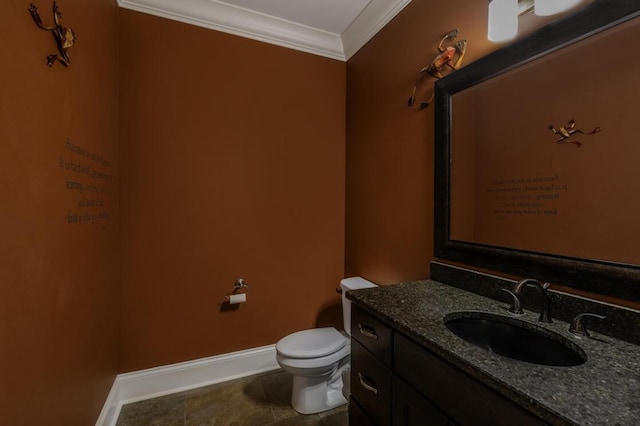 half bath with baseboards, toilet, tile patterned flooring, crown molding, and vanity