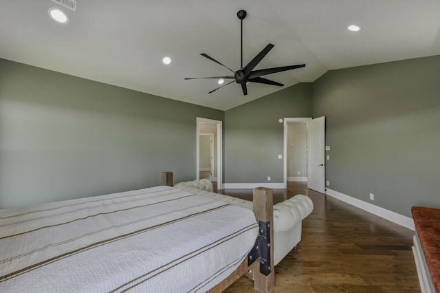 bedroom featuring lofted ceiling, baseboards, wood finished floors, and recessed lighting