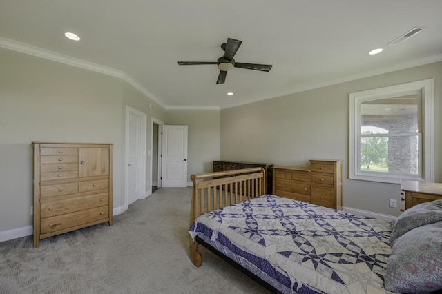 bedroom featuring baseboards, visible vents, and crown molding