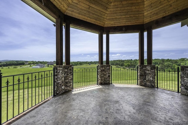 view of patio featuring a gazebo and a rural view