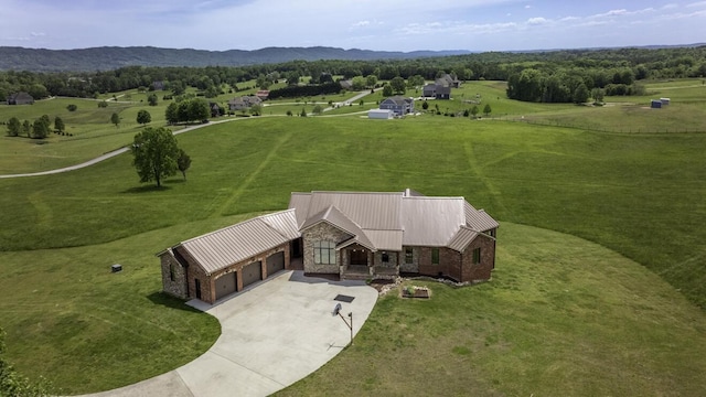 bird's eye view with a rural view and a mountain view