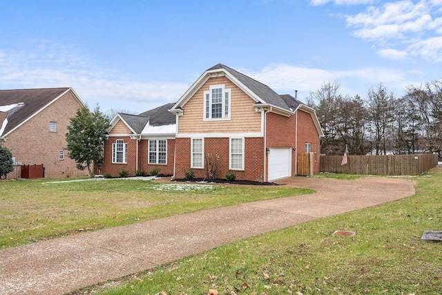 view of front facade featuring brick siding, concrete driveway, fence, a garage, and a front lawn