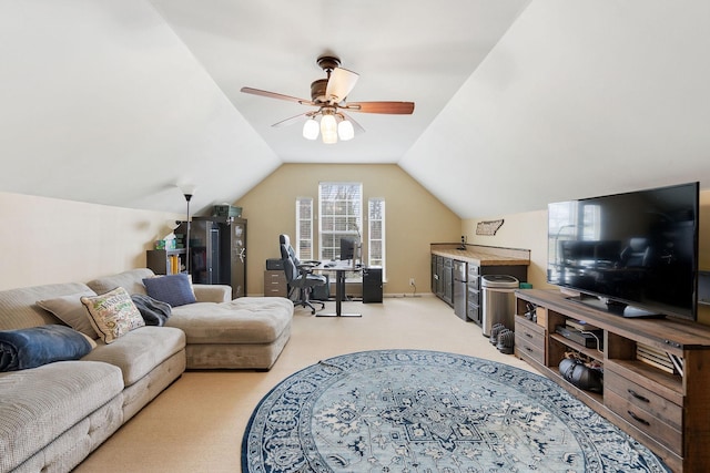 living area featuring lofted ceiling, baseboards, a ceiling fan, and light colored carpet