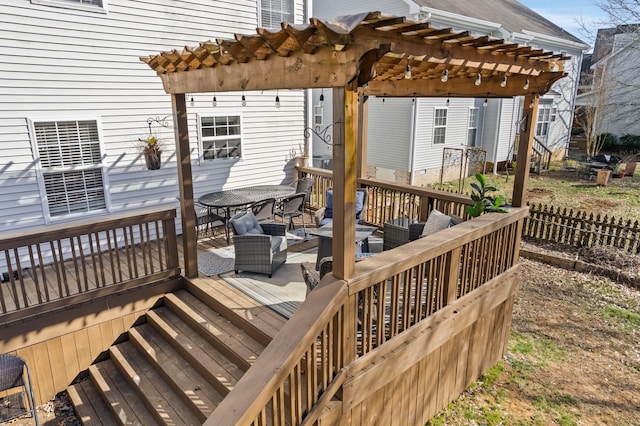 deck with outdoor dining area, an outdoor living space, and a pergola