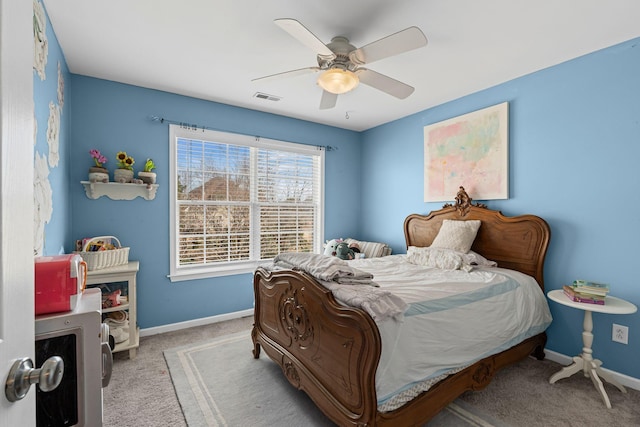 bedroom featuring carpet floors, visible vents, ceiling fan, and baseboards