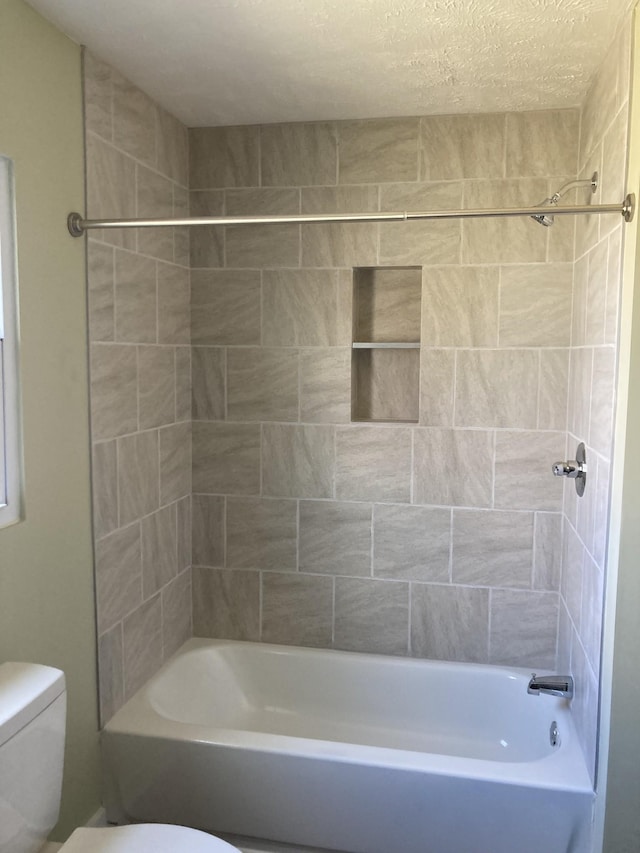 full bathroom with toilet and shower / bath combination