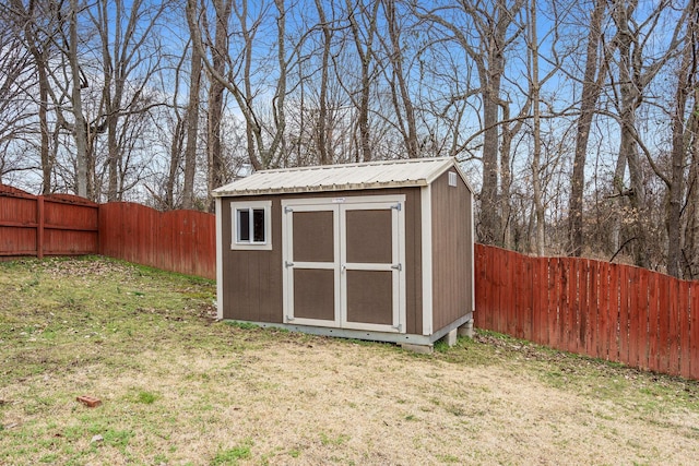 view of shed featuring a fenced backyard