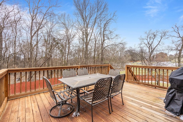 deck with outdoor dining space