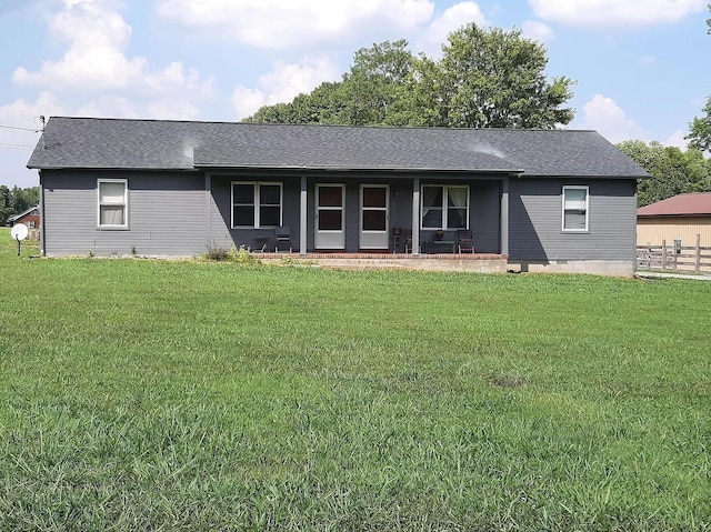 view of front of property featuring roof with shingles, a front lawn, crawl space, and fence