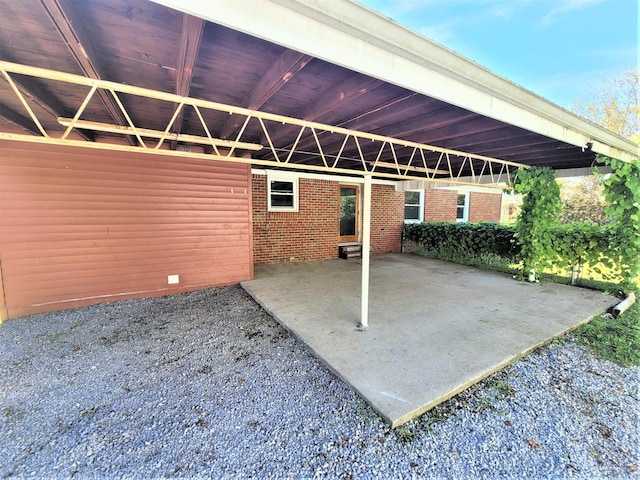 view of patio featuring a carport