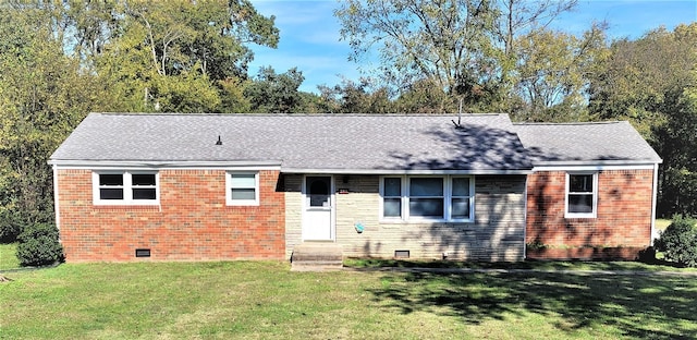 ranch-style home with entry steps, a shingled roof, crawl space, and a front yard