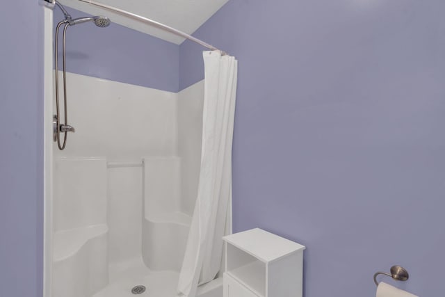 full bathroom with a shower with shower curtain