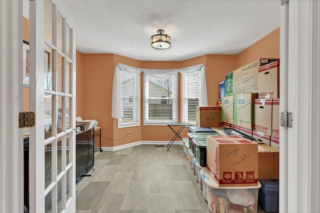 storage featuring french doors