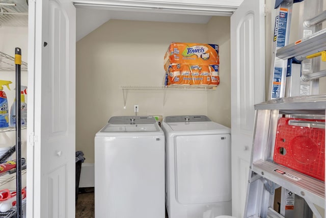 laundry room with laundry area and washer and clothes dryer