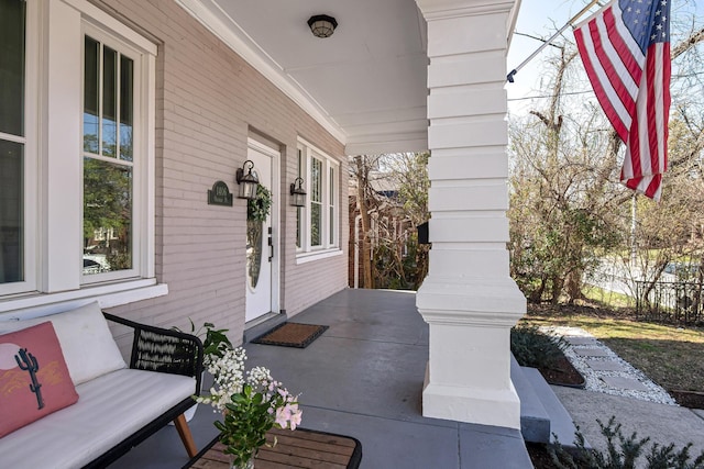 view of patio featuring a porch