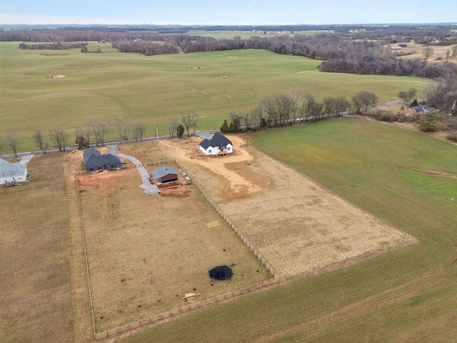 birds eye view of property featuring a rural view