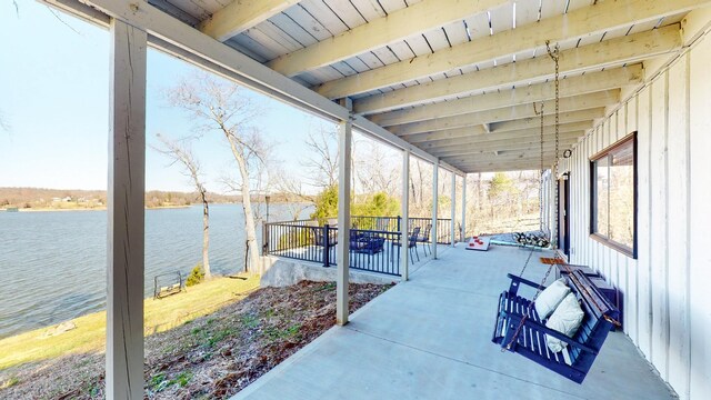 view of patio / terrace with a water view