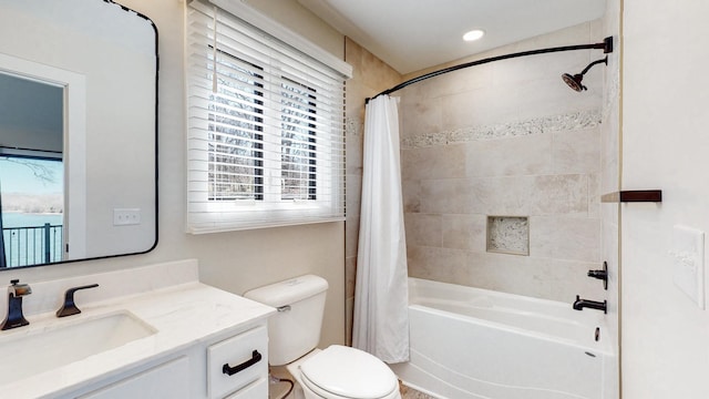 full bathroom featuring shower / bath combo, vanity, toilet, and recessed lighting