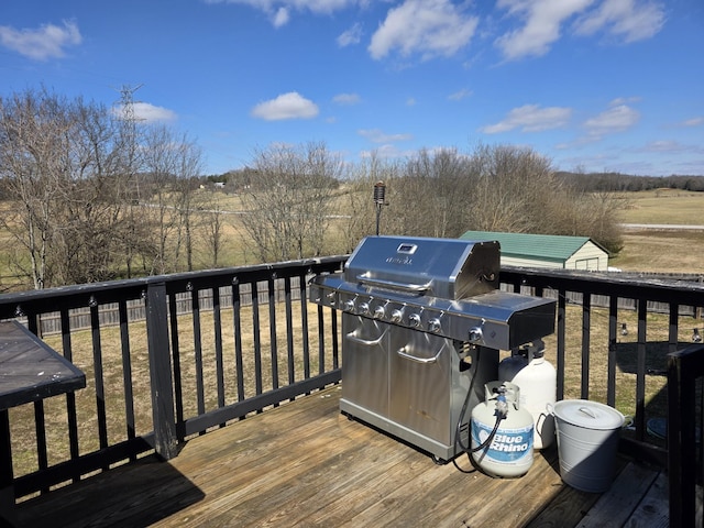 wooden deck with grilling area