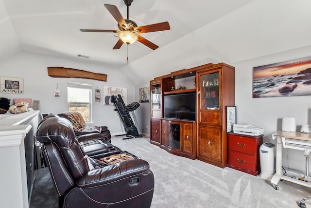 living area with light carpet, visible vents, a ceiling fan, and lofted ceiling