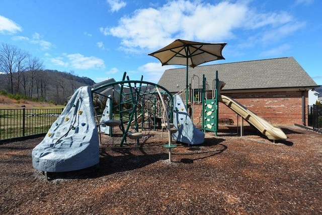 community play area featuring fence