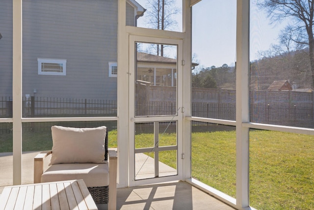 sunroom / solarium with a wealth of natural light