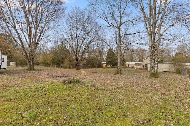 view of yard featuring fence