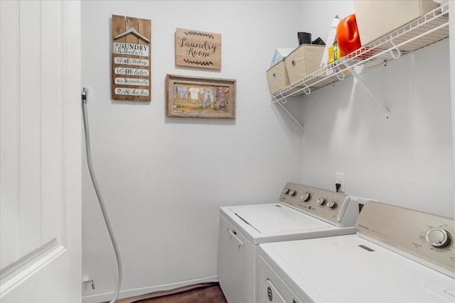 washroom featuring laundry area and washing machine and dryer