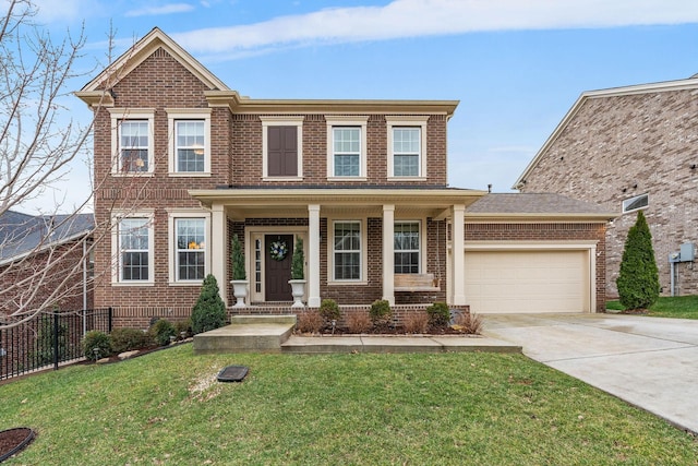 view of front of house with a garage, concrete driveway, brick siding, and fence