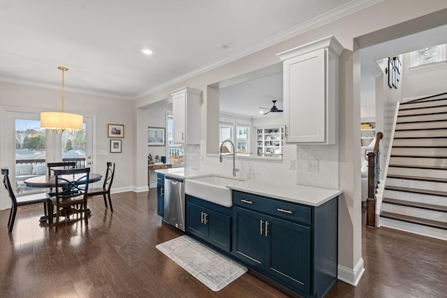 kitchen featuring a sink, white cabinetry, and stainless steel dishwasher