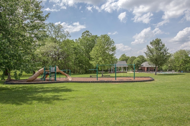 community play area featuring a lawn