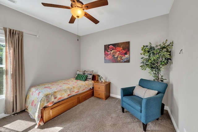 bedroom with carpet, baseboards, and ceiling fan