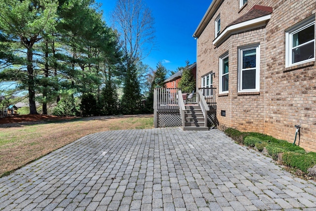 view of patio / terrace featuring a wooden deck