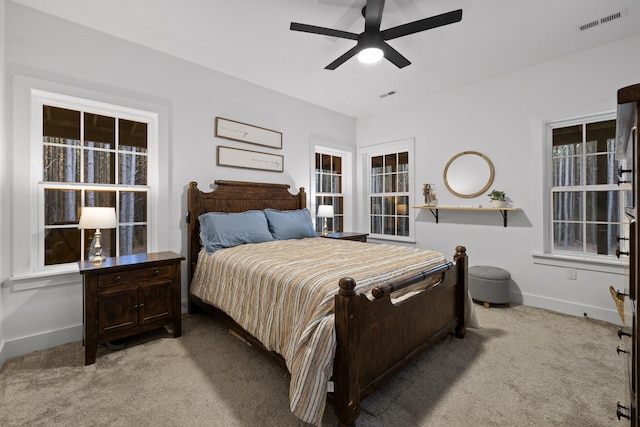 bedroom featuring carpet floors, baseboards, and visible vents