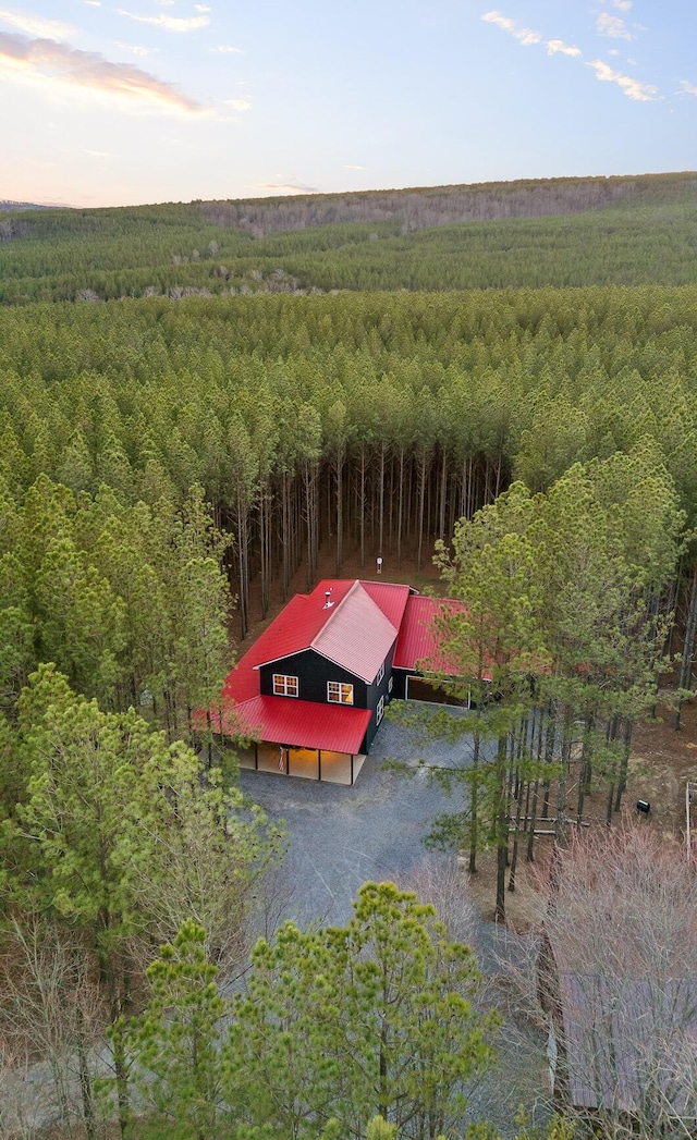 aerial view featuring a forest view