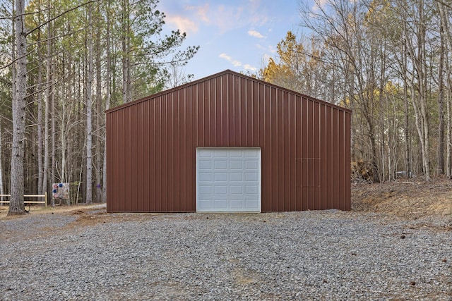 detached garage featuring driveway