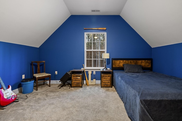 carpeted bedroom featuring lofted ceiling, visible vents, and baseboards