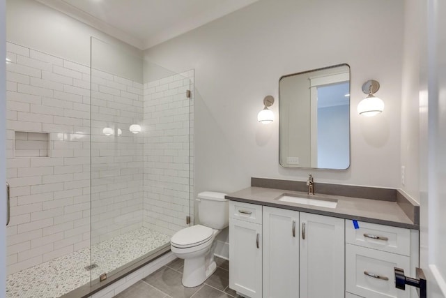 full bathroom with vanity, tile patterned floors, toilet, and a stall shower