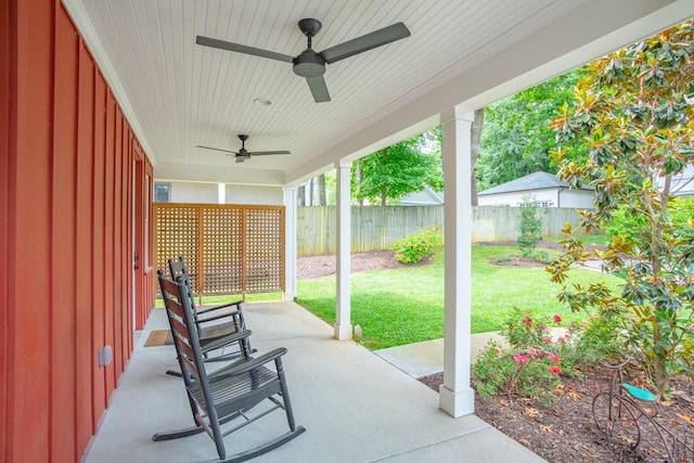 view of patio / terrace with a fenced backyard and ceiling fan