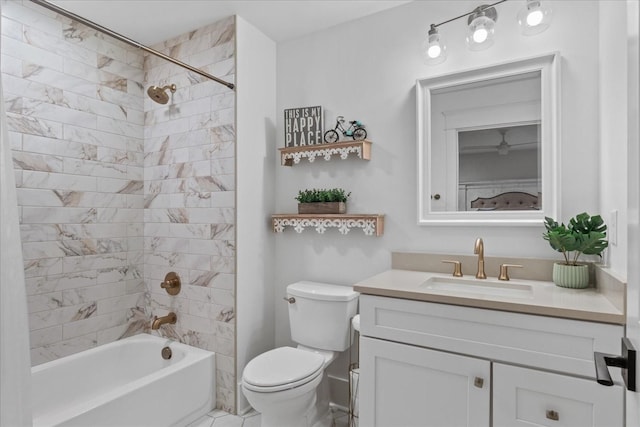 bathroom with toilet, shower / bathing tub combination, and vanity