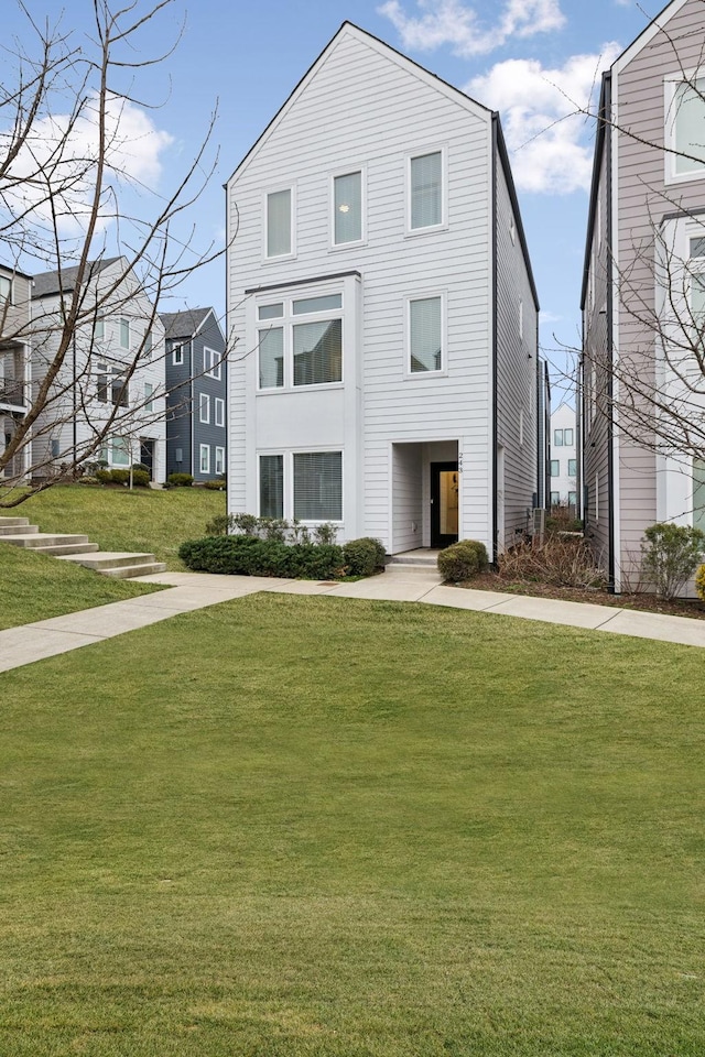 view of front of house with a front lawn