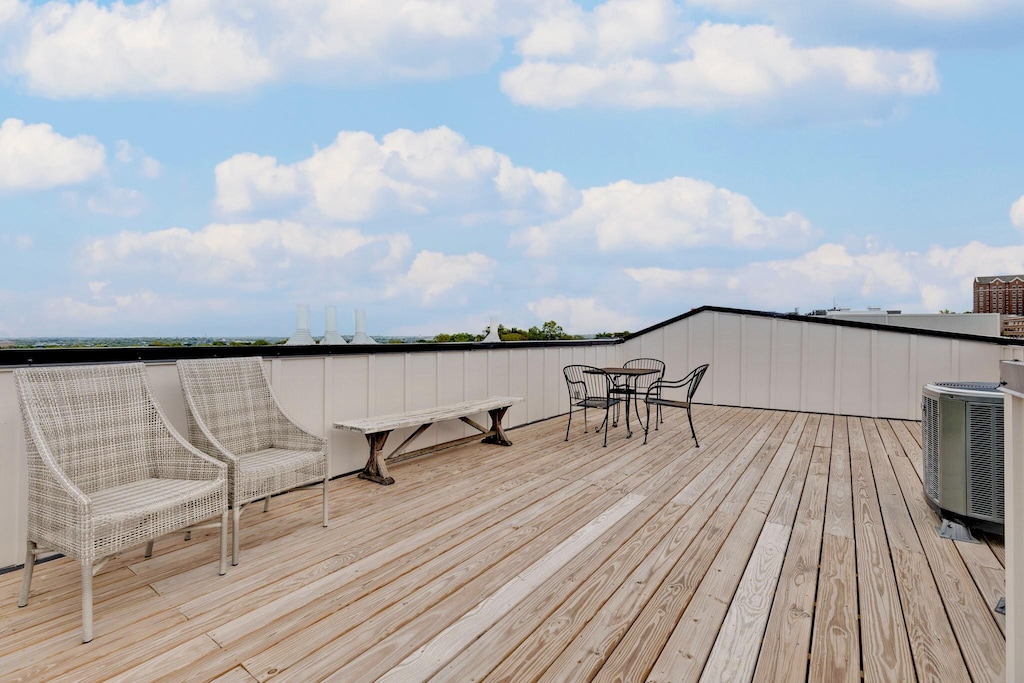 wooden terrace with central air condition unit