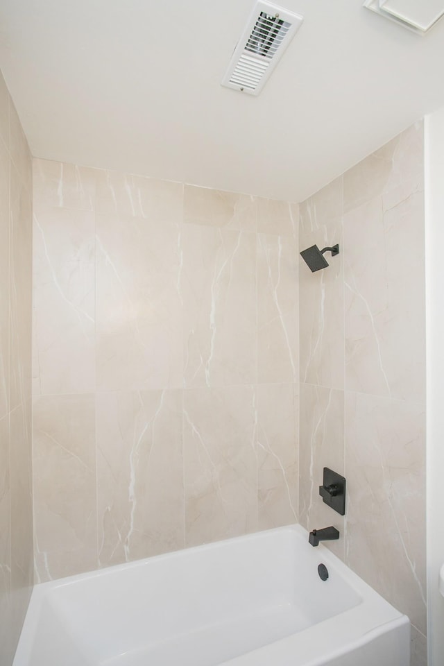 full bathroom featuring visible vents and bathing tub / shower combination