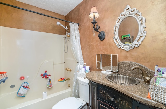 full bath featuring toilet, vanity, a textured ceiling, and shower / tub combo with curtain