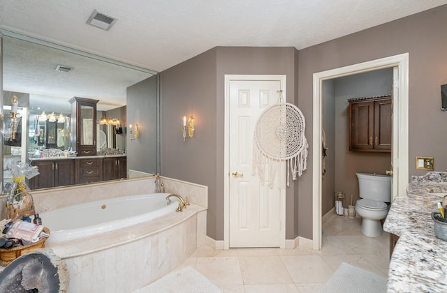 bathroom with visible vents, toilet, a textured ceiling, vanity, and a bath